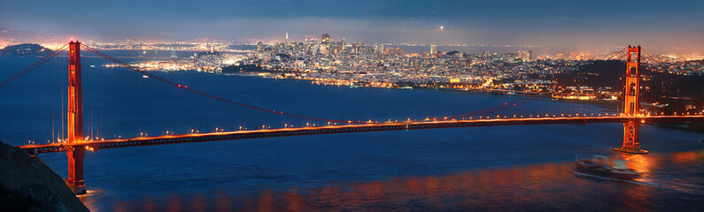 Golden Gate Bridge in Blue Hour with Cargo Ship © shoenberg3