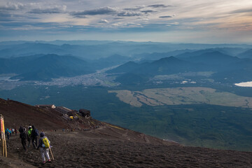Yamanashi, Japan - August 25, 2017: Mt. Fuji climbing. A photo of people are climbing back from top