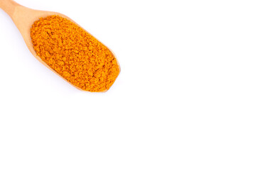 Turmeric powder (Tumeric curcumin, Curcuma ) in wooden spoon isolated on white background.