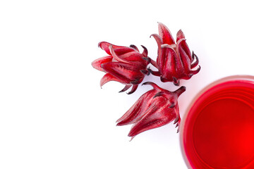 glass of roselle juice tea and sorrel flower isolated on  white. 