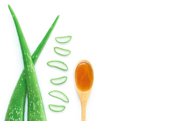 Aloevera leaf and honey isolated on white.