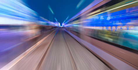 High speed train runs on rail tracks . Train in motion