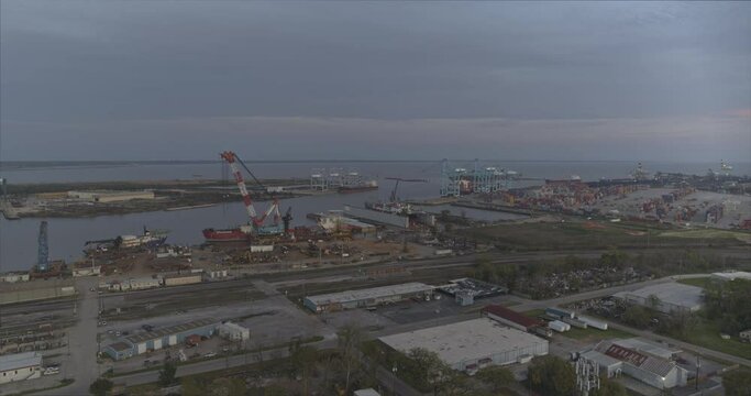 Mobile Alabama Aerial v19 shipyards and cityscape at sunset right to left pan - DJI Inspire 2, X7, 6k - March 2020