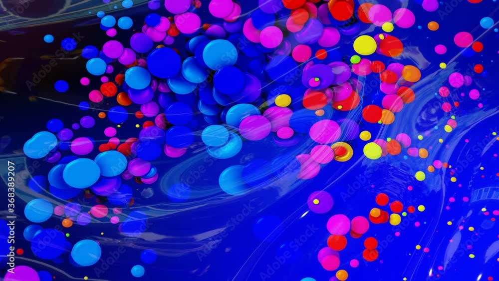 Poster abstract looped background of shiny glossy surface like wavy blue liquid with rainbow color circles 