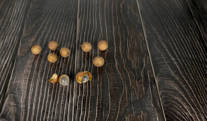 longan lay on a wooden background.