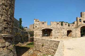 Fototapeta na wymiar Fortress wall near Saint Paul Gate, the Old Town of Rhodes, Rhodes, Greece