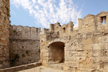 Fototapeta na wymiar Fortress wall near Saint Paul Gate, the Old Town of Rhodes, Rhodes, Greece