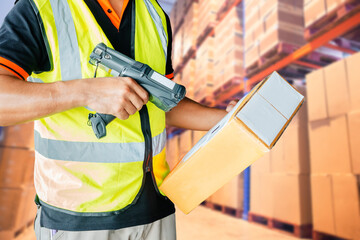 Warehouse storage, inventory management. Worker scanning barcode scanner on shipment box. Manufacturing cargo warehouse export. Computer equipment for inventory management.