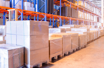 Cargo warehouse storage, inventory management. Heavy pallet goods in the warehouse with tall shelves.