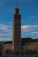 Fototapeta premium The square with people and the Hassan II Mosque is the largest mosque in Morocco.