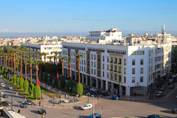 View from the hotel to the Boulevard with beautiful palm trees and the houses of Rabat with beautiful balconies.