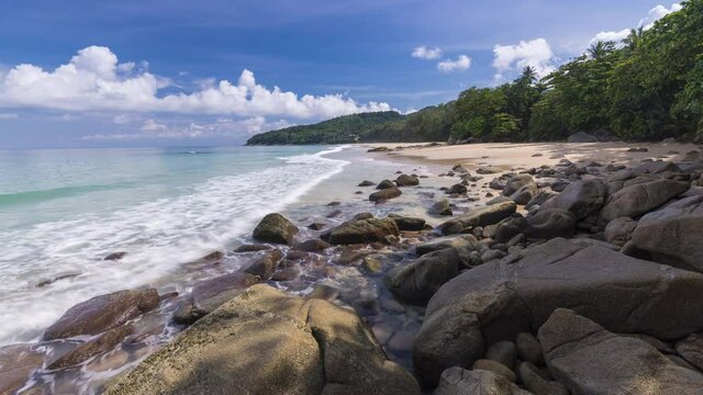 beautiful white Nai Thon Beach with blue sky and big wave, Phuket Thailand