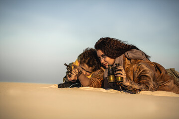 Post apocalyptic Woman and Boy Outdoors in a Wasteland