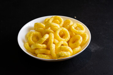Corn rings with spices in a bowl