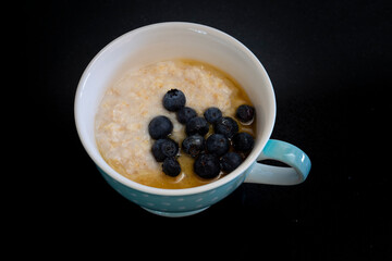 Healthy Breakfast Oatmeal Bowl with Blueberry