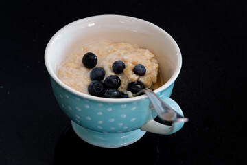 Healthy Breakfast Oatmeal Bowl with Blueberry