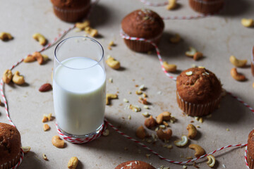Milk and cupcake on the table