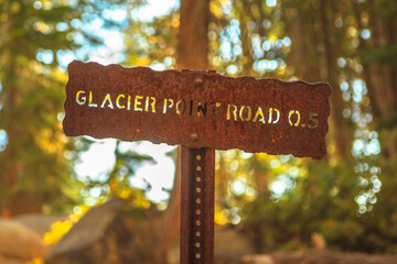 Road sign of Glacier Point road in Yosemite National Park, California, United States. Glacier Point is the view of Half Dome, Clouds Rest, Liberty Cap, Vernal Fall and Nevada Fall in Yosemite Valley.