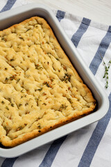 Home-baked Rosemary Garlic Focaccia Bread, side view.