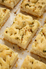 Home-baked Rosemary Garlic Focaccia Bread, low angle view. Close-up.