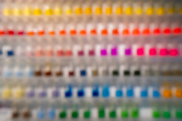 Blur background of colorful colored powder in store