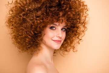 Fototapeta premium Close up side profile photo beautiful she her wear no clothes nude pretty lady dreamer ideal skin condition salon stylist curls perms roller curlers tint wellness isolated beige pastel background