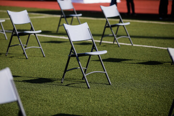 Chairs apart one from another to maintain the social distance during the Covid-19 outbreak at an...