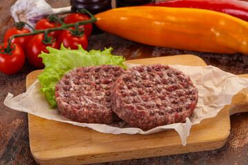 Raw burger cutlet