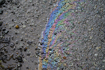 Gasoline flows on the pavement.