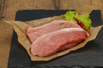 Juicy raw pork steak meat