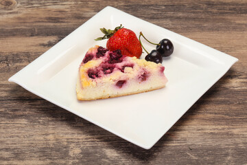 Cheesecake with cherry served strawberry
