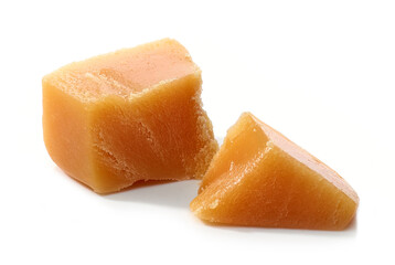 caramel pieces on white background