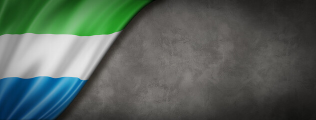 Sierra Leone flag on concrete wall banner