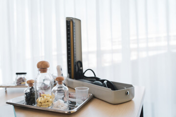 Medicine pill on table in doctor working room at hospital , Health care and medical concept wiht copy space