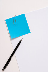 Blank paper memo with clip on white background
