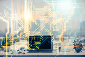 Double exposure of desktop with computer and world map hologram. International data network concept.