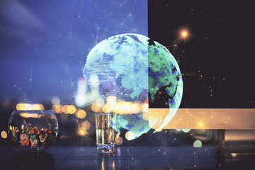 Fototapeta premium Computer on desktop with social network hologram. Double exposure. Concept of international people connections.
