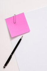 Blank paper memo with clip on white background
