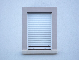 Window with roller shutter