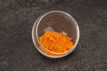 Tumeric powder in the bowl