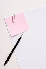 Blank paper memo with clip on white background
