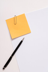 Blank paper memo with clip on white background
