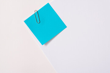Blank paper memo with clip on white background
