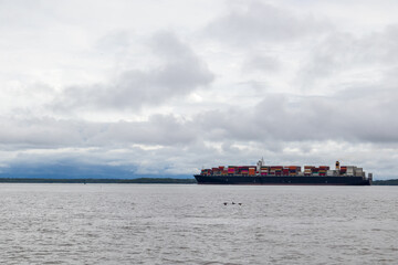 Massive container ship entering to buenaventura's port