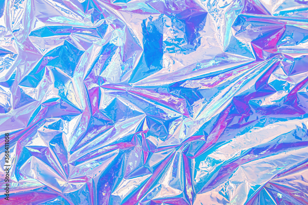 Aufkleber Blurred abstract Modern pastel colored holographic background in 80s style. Crumpled iridescent foil real texture. Synthwave. Vaporwave style. Retrowave, retro futurism, webpunk