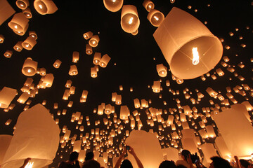 Launching floating sky lanterns in Chiang Mai, Loykratong Festival