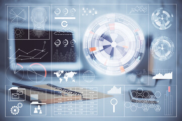 Double exposure of desktop computer and technology theme hologram. Concept of software development.