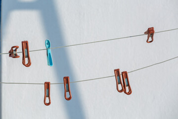 Fototapeta premium red pegs with shadows on a white background