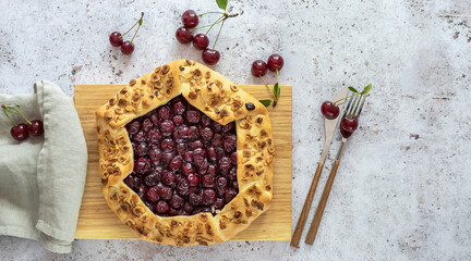 Top view of sour cherry open tart galette
