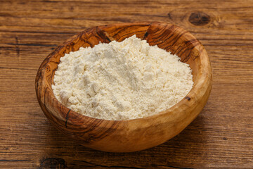 Wheat flour heap in the bowl